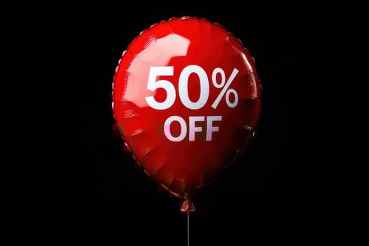 50 off percent discount concept. Bright red balloons on a black background. black Friday sale concept photo