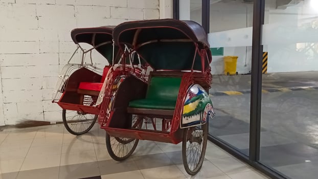 Indonesia Clean and colorful antique pedicabs photo