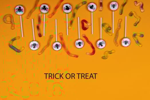 Halloween candy orange color background photo