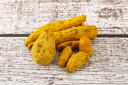 Indian spices - Turmeric root Curcuma photo