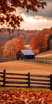Autumn rural landscape with a barn and colorful trees in the countryside photo