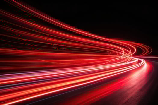 Abstract red light trails in the dark background Low Angle photo