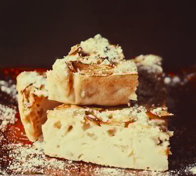 Homemade sweet apple pie with cinnamon and and powdered sugar. photo