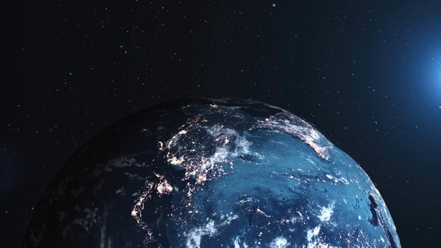 Detailed view of Earth from space showcasing bright city lights at night and the dazzling brightness of the sun illuminating the planet photo