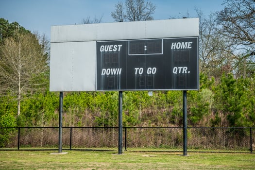 Blank scoreboard in a soccer field photo