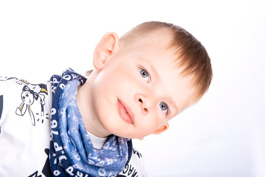 Portrait of happy joyful little boy isolated on white background photo