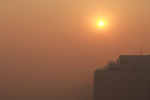 Thick clouds of Smoke darken the morning sun from a huge fire in the National Park near the Northwest section of Brasilia, known as Noroeste photo