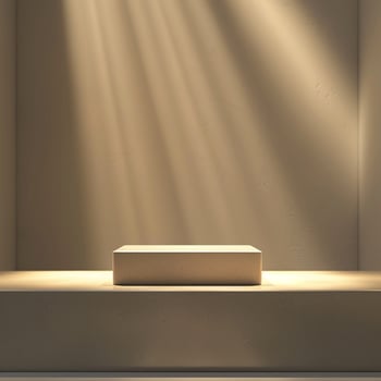 An empty box on a shelf in a room with light coming from the wall photo