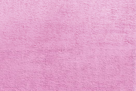 Texture of pink plaster. Interior of a modern loft. Abstract rough background. The facade of an old house. photo