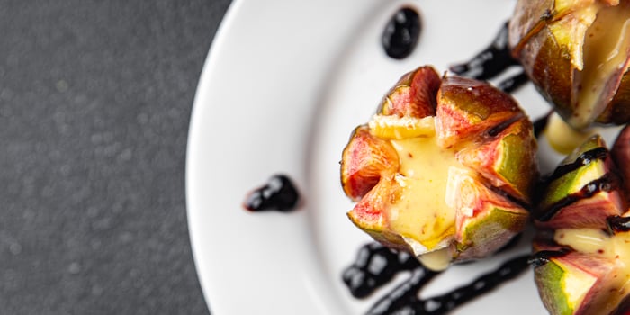 figs baked cheese camembert or brie meal snack on the table copy space food background rustic photo