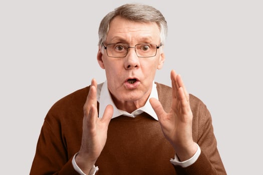 Shocked Elderly Man Looking At Camera Posing Over Gray Studio Background. Don't Do It, Warning Concept photo