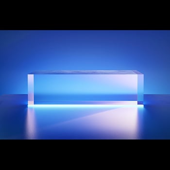 A blue light shining on a glass block photo