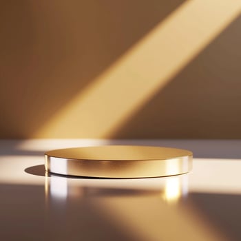 A golden object on a table in front of a wall photo