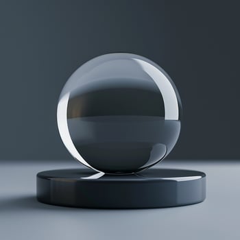 A glass ball on a black stand photo