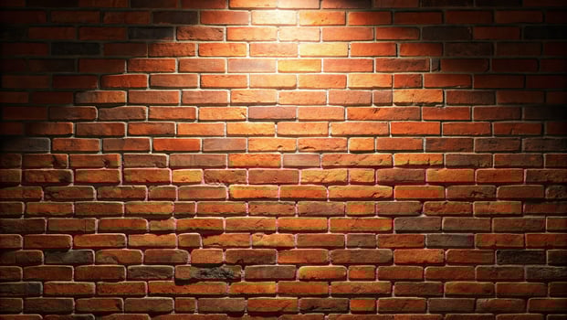 Red block wall with yellow upper lamp background photo