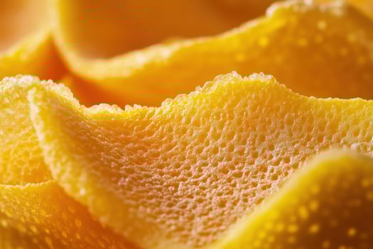 Close-up of a fresh orange peel, showcasing its vibrant color and unique texture photo