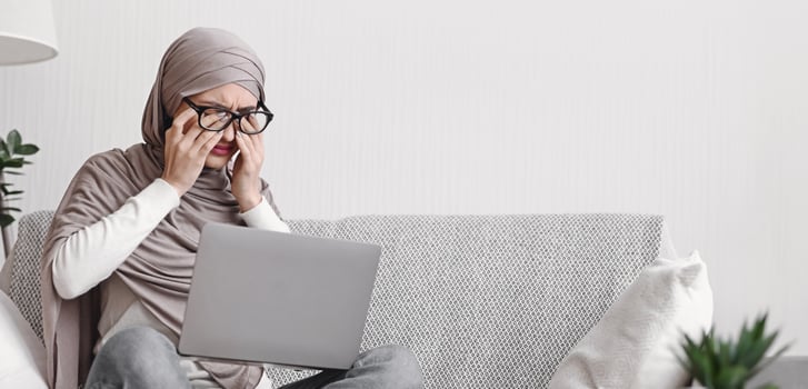 Eye Strain. Tired Muslim Woman In Hijab Having Eyesight Problem, Massaging Nosebridge After Working On Laptop At Home, Free Space photo