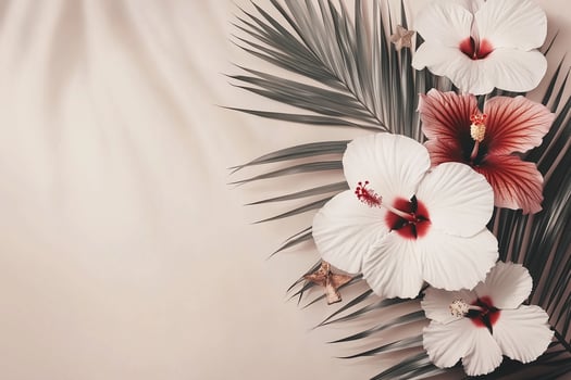 Tropical background with hibiscus flowers and palm tree leaf casting shadow Christmas, New Year photo