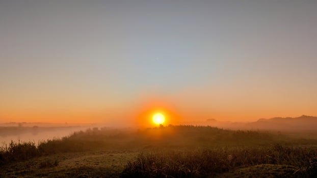 Beautiful sunrise landscape scenery at Clare river, County Galway, Ireland, nature sun background, misty dawn photo