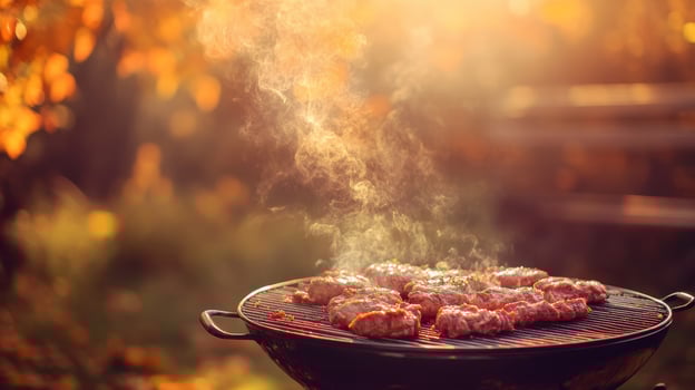 Enjoy autumns beauty with barbecue grilling, savoring delicious meats outdoors among stunning fall colors, while cherishing moments with loved ones in this picturesque, warm season photo