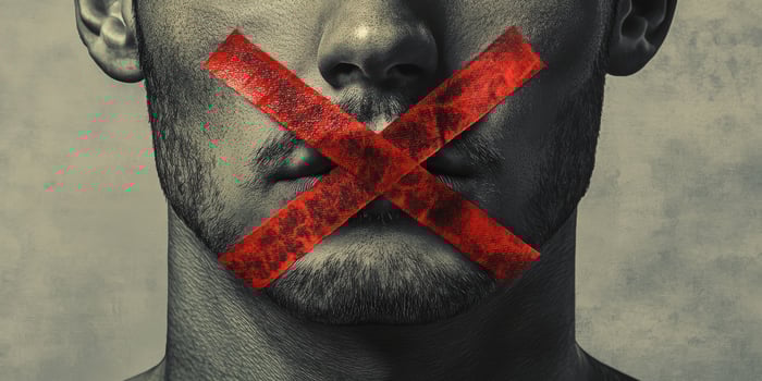 A man with red tape over his mouth symbolizes censorship, highlighting the limitations on free expression in a society where many voices are silenced by complex forces and influences photo