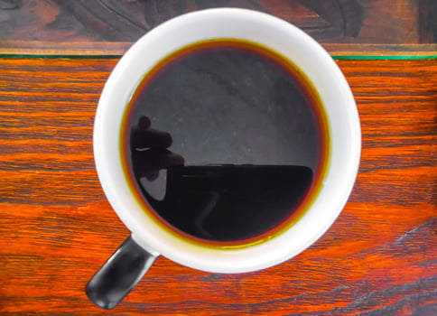 Cup of americano black coffee in restaurant cafe in Mexico. photo