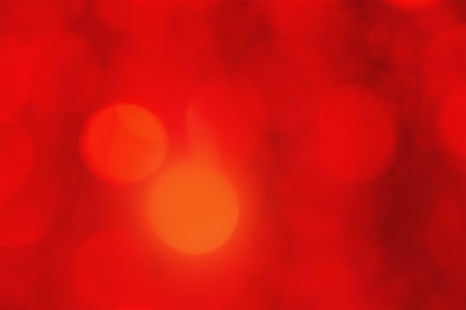 Red defocus light background. Glitter defocus fabric. photo