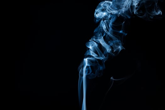 Smoke from flames or fog clouds graphic design art isolated on dark black background. photo