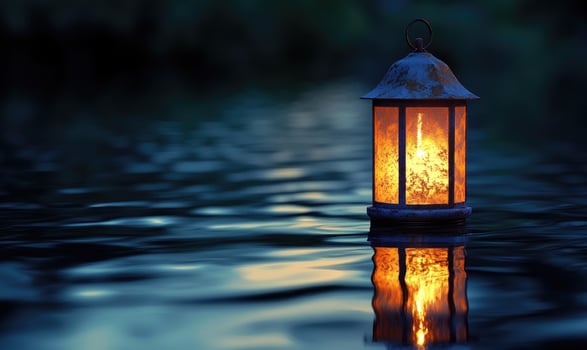 Single floating candle on rippling water, soft golden glow illuminating the scene photo