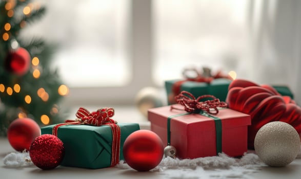A Christmas tree with a bunch of presents on the ground photo