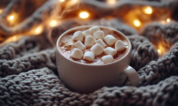 A mug of hot chocolate with marshmallows on top photo