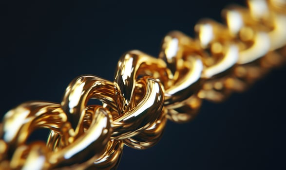 A gold chain with a gold clasp photo