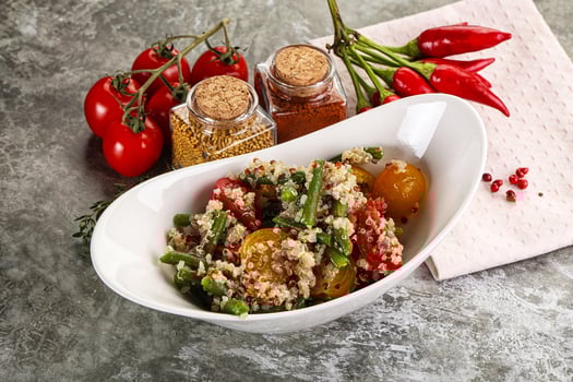 Vegan boiled quinoa with vegetables photo
