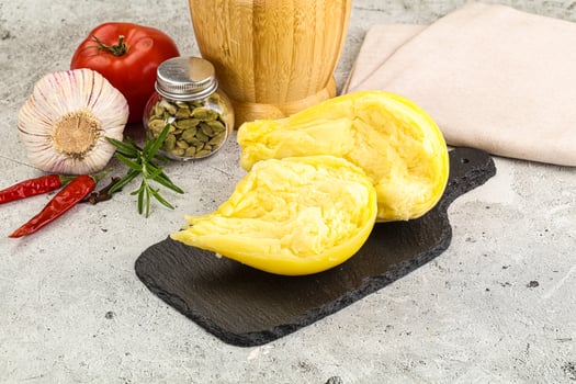 Italian traditional yellow Scamorza cheese photo