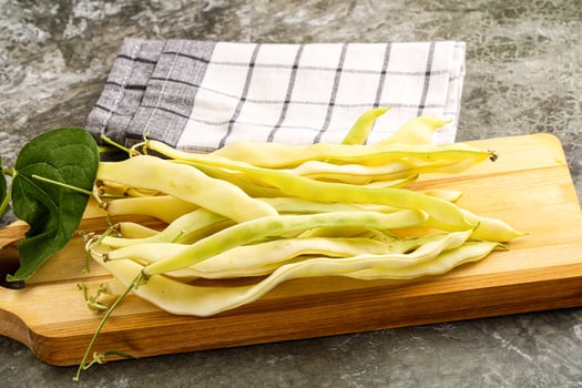 Raw green bean strings heap photo