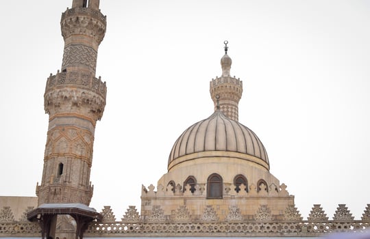 the minaret and dome scene of al-azhar mosque at cairo egypt on sunny day photo