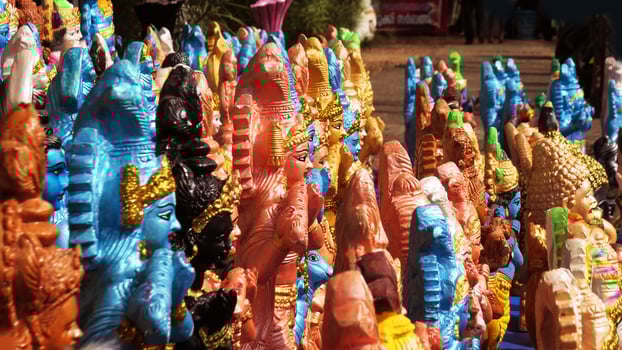Colorful mythological sculptures displayed in a handicraft shop photo