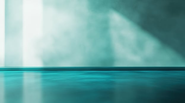 An empty room with a blue floor and wall photo