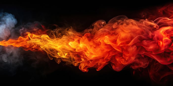 Abstract red and orange smoke swirling on black background photo