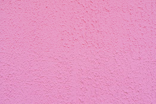 Texture of rough pink plaster. Architectural abstract background. photo