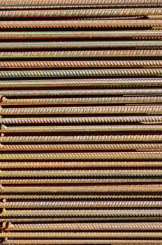 a pile of steel bars stacked together photo