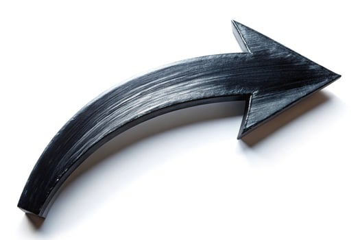 Abstract black arrow on white background with shallow depth of field photo