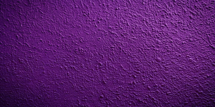 Abstract dark purple textured paint on wall background photo