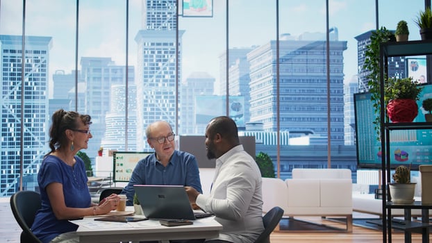 Mature couple engaged in a serious discussion with a financial banker about retirement planning, focusing on optimizing savings, pension plans and financial security. Life insurance. Camera B. photo