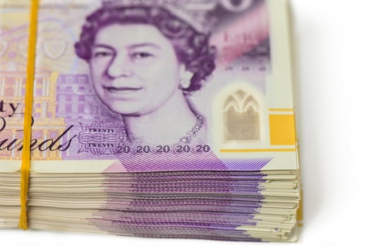 UK pound,money of United kingdom close up on white, Pound UK note photo