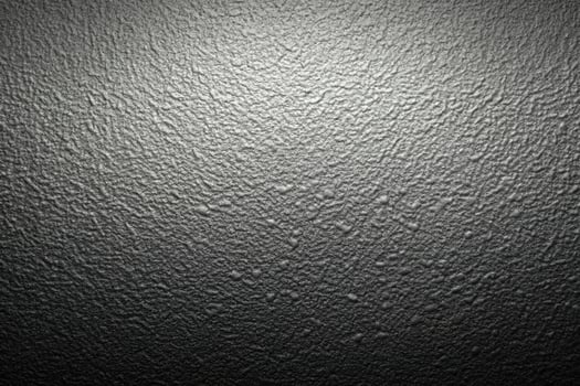 Abstract black and white gradient background with grainy texture, macro shot photo