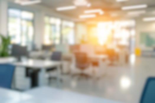 Blurred background of modern workplace with lots of greenery and natural light. Interior shots of offices photo