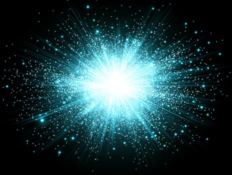 An explosive display of brilliant blue particles bursts forth, illuminating the darkness with its ethereal glow, creating a mesmerizing cosmic spectacle of energy and light. photo