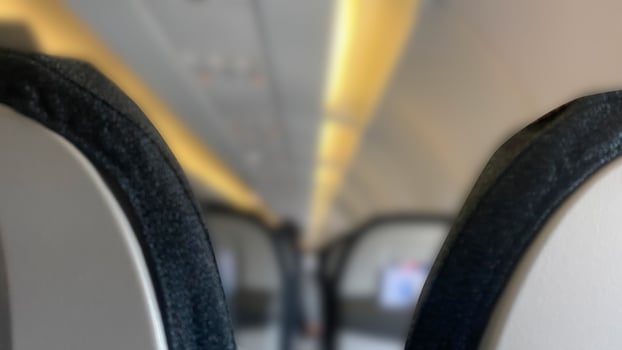 Airplane Seatback bokeh with warm light photo