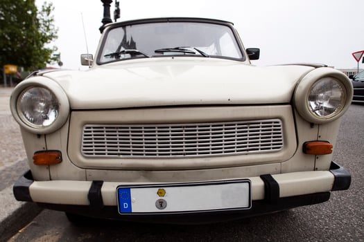 Classic Trabant Car Parked in Berlin, Germany on a Cloudy Day photo